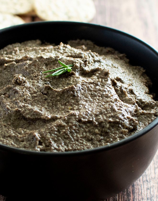 A close up of roasted mushroom pate in a bowl.