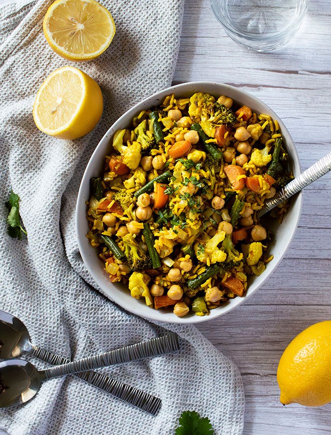 Overhead view of a bowl of warm indian rice salad.