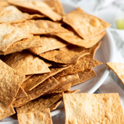 A plate of baked tortilla chips.