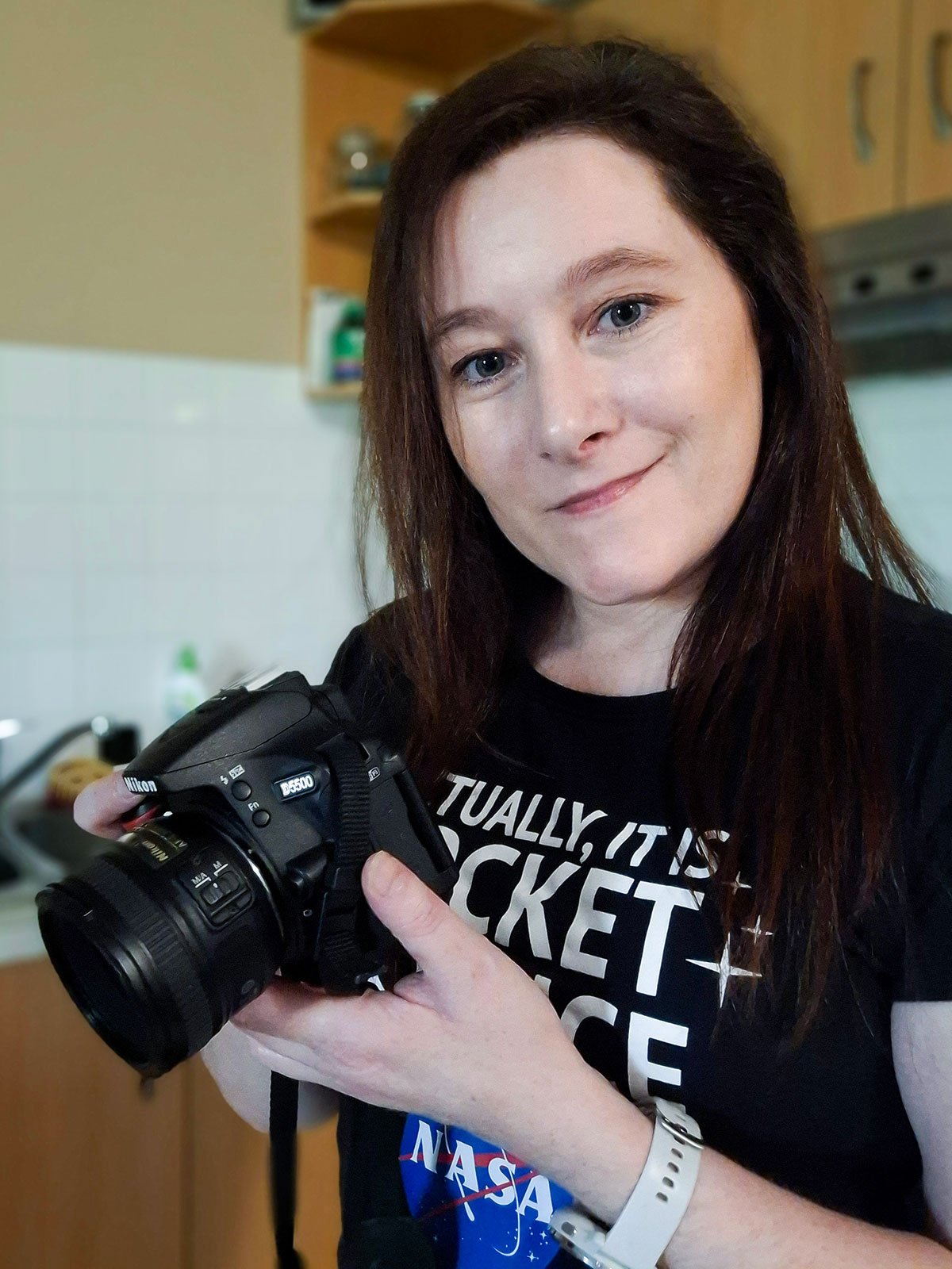 Lauren holding a camera.